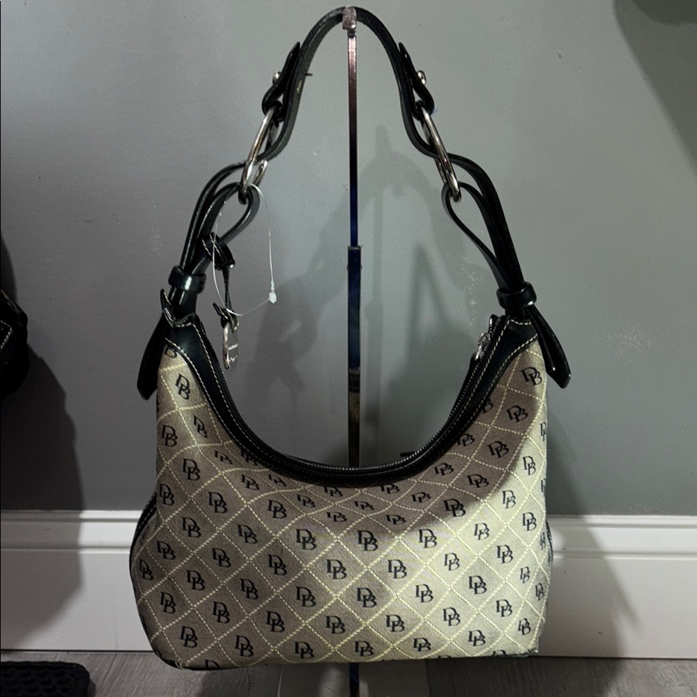 Dooney & Bourke Cream and Black Shoulder Bag with Slouchy Silhouette